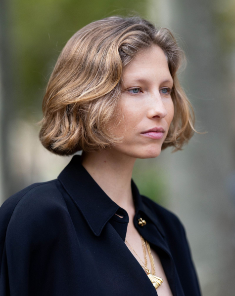 Woman with blonde balayage bob